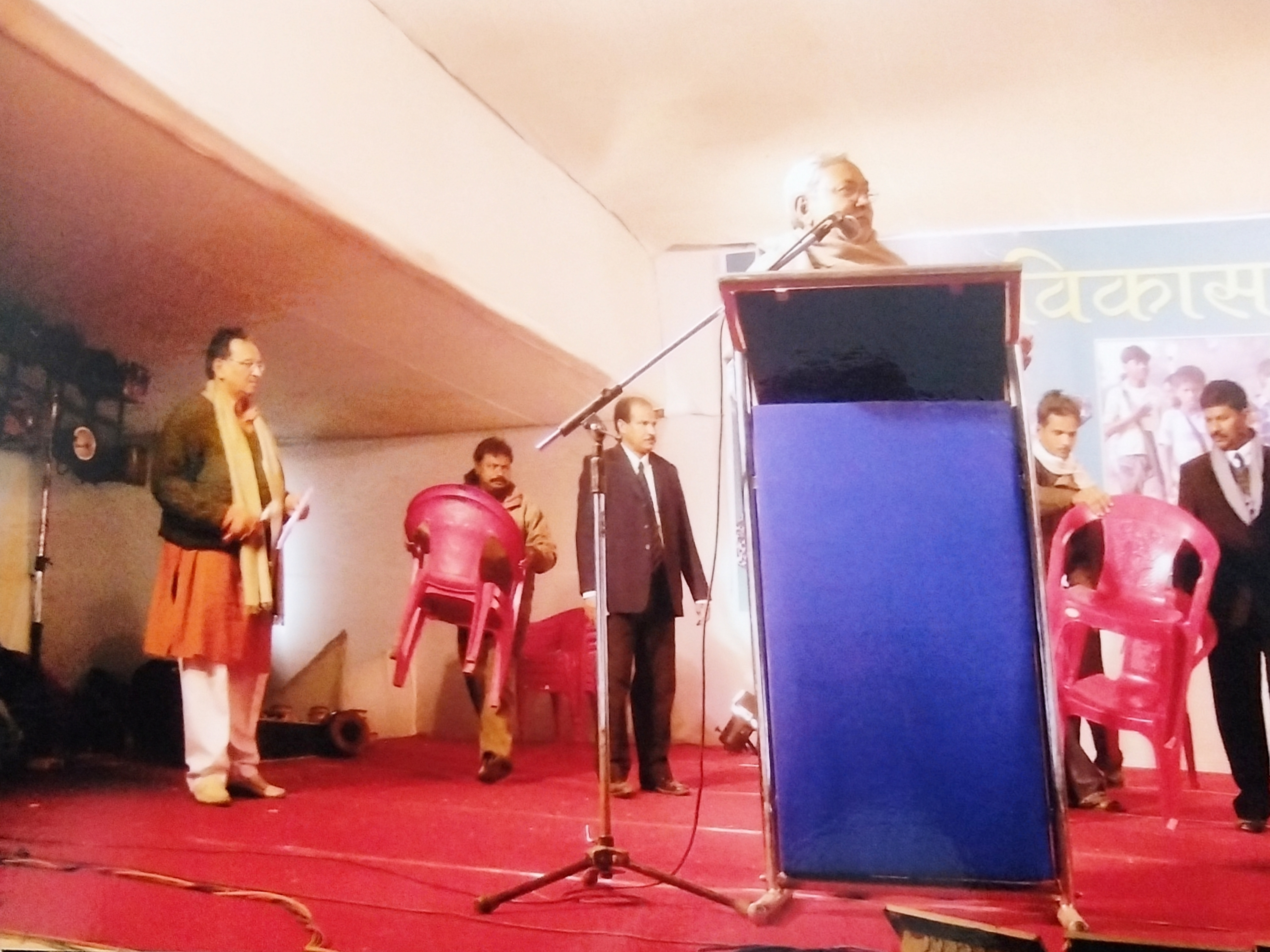 Shri Suman Kumar on stage at a state cultural development convention